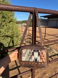 Mini sling concealed carry cross body