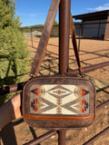 Mini sling concealed carry cross body